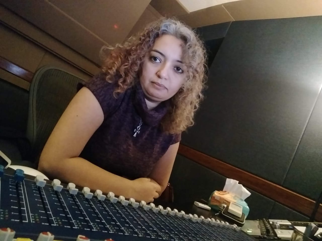 Shery Shokry at a studio mixing console